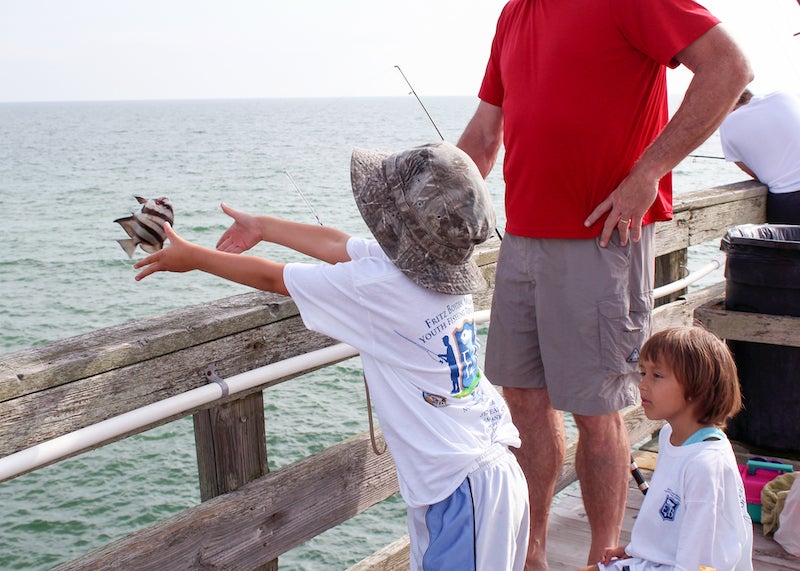 Fishin Fun: Smiling kids enjoy free fishing tourney - The